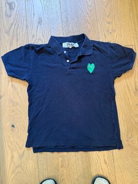 Navy Polo Shirt with Green Heart Patch